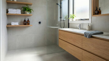 Kategorie Reinigungsmittel und Pflegemittel - Modernes Badezimmer mit sauberer Waschtischanlage und hellen Holzoberflächen – Reinigungsprodukte und Pflegemittel für hygienische, schonende Pflege von Holz im Bad und Innenbereich.